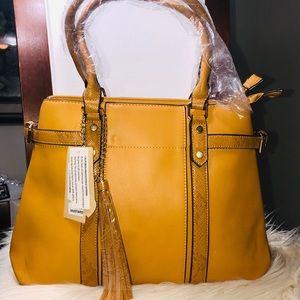 Jolene Couture.  Bags Yellowbag with  quite